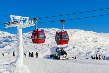 Red cable car in a ski resort in the Alps. Red gondola funicular in a ski resort, sweden, frosty