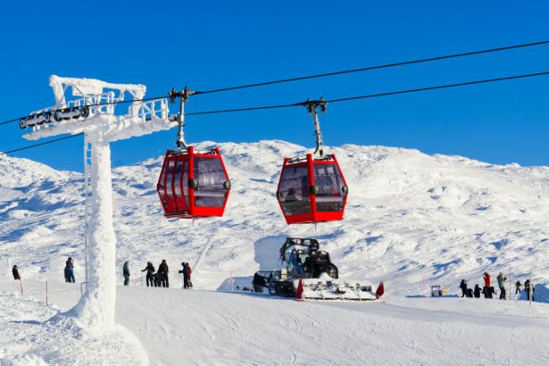 Red cable car in a ski resort in the Alps. Red gondola funicular in a ski resort, sweden, frosty
